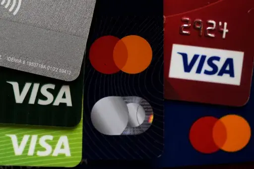 Several VISA and MASTER credit cards are shown in Buffalo Grove, Ill., Thursday, Feb. 8, 2024. (AP Photo/Nam Y. Huh, File)