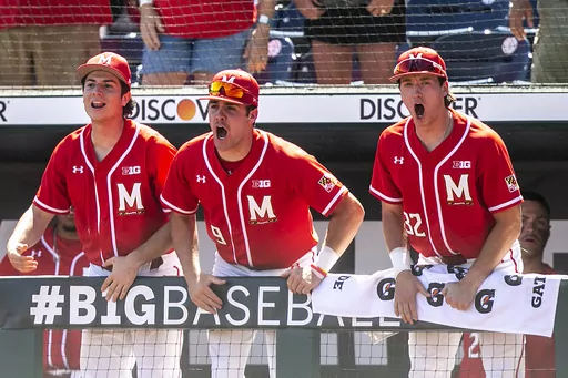 Maryland's Simmi Whitehill, center, cheers on teammates during an NCAA college baseball game against Nebraska, Saturday, May 27, 2023, in Omaha, Neb. (Joseph Cress/Iowa City Press-Citizen via AP)