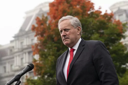 White House chief of staff Mark Meadows speaks with reporters at the White House, Wednesday, Oct. 21, 2020, in Washington. A federal judge in Atlanta is set to hear arguments Monday, Aug. 28, 2023, on whether Mark Meadows should be allowed to fight the Georgia indictment accusing him of participating in an illegal scheme to overturn the 2020 election in federal court rather than in a state court. (AP Photo/Alex Brandon, File)