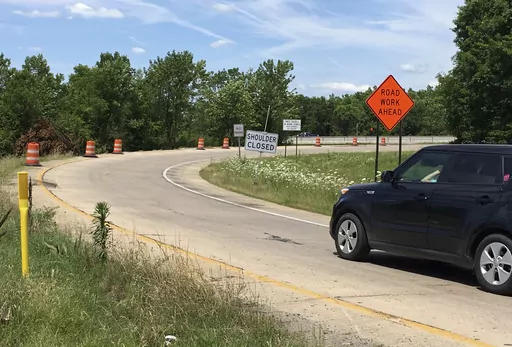 A motorist prepares to enter a construction area on Interstate 440 in North Little Rock, Ark., June 7, 2017. A half-cent sales tax for highways that voters approved in 2020 is not limited to funding four-lane roads, the Arkansas Supreme Court ruled Thursday, March 16, 2023, clearing the way for the tax to help fund an interstate project in the downtown Little Rock area. (AP Photo/Kelly P. Kissel, File)