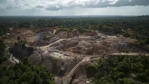 An aerial view of the Tassawini gold mining operation, in Chinese Landing, Guyana, Monday, April 17, 2023. The mining operation spans 3,400 acres or 1,380 hectares. (AP Photo/Matias Delacroix)