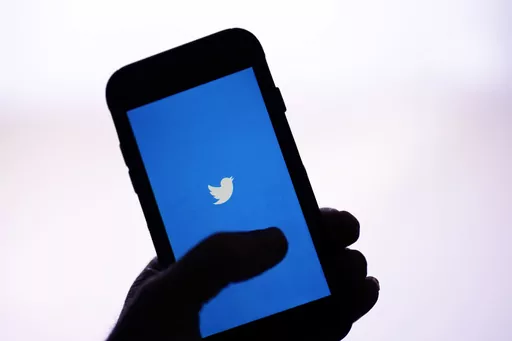 The Twitter application is seen on a digital device, April 25, 2022, in San Diego. Twitter has removed the verification check mark on the main account of The New York Times, one of CEO Elon Musk’s most despised news organizations. The removal comes as many of Twitter’s high-profile users are bracing for the loss of the blue check marks that helped verify their identity and distinguish them from imposters on the social media platform. (AP Photo/Gregory Bull, File)