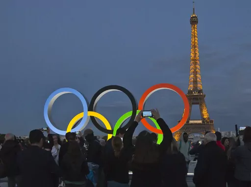 The Olympic rings are set up on Trocadero plaza that overlooks the Eiffel Tower, a day after the official announcement that the 2024 Summer Olympic Games will be in the French capital, in Paris, Thursday, Sept. 14, 2017. The organizers of the Paris Games say the Olympic rings will be displayed on the Eiffel Tower. The five-ring creation is 29-meters long and 15-meter high, made entirely of recycled steel, the Games organizers said in a statement Monday April, 8, 2024. (AP Photo//Michel Euler, Fi