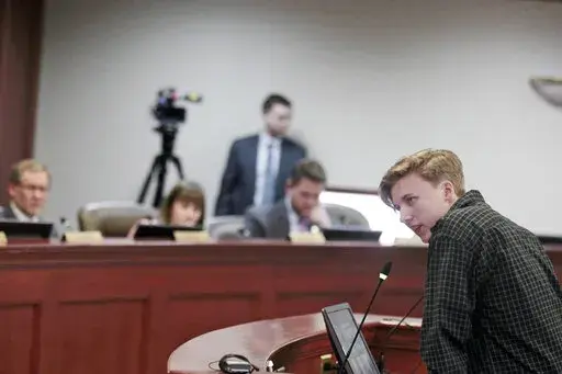 Elliot Morehead, 16 of Sioux Falls, tells a House Health and Human Services committee Tuesday, Jan. 31, 2023, in Pierre, S.D., that a bill banning gender-affirming care for transgender youth would harm their development as their unique self. (AP Photo/Amancai Biraben)