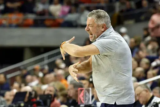 Auburn head coach Bruce Pearl reacts to a call during the first half of an NCAA college basketball game against Arkansas, Wednesday, Feb. 19, 2025, in Auburn, Ala. (AP Photo/Butch Dill)