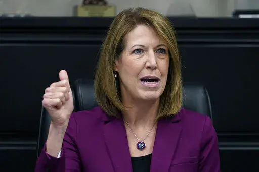 Rep. Cindy Axne, D-Iowa, speaks during a roundtable discussion at the Elite Octane ethanol plant Nov. 9, 2021, in Atlantic, Iowa. Moments after she flipped a longtime Republican congressional seat in 2018, Axne declared that "Washington doesn't have our back and we deserve a heck of a lot better." Now seeking a third term in one of the most competitive House races, Axne is sounding a similar tone, telling voters she's delivered for Iowans "while Washington politicians bicker." (AP Photo/Charlie 
