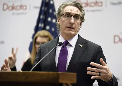 North Dakota Gov. Doug Burgum speaks at the state Capitol on April 10, 2020, in Bismarck, N.D. Burgum has signed a veto-proof bill into law, Thursday, April 20, 2023, that restricts transgender health care and criminalizes providers who give gender-affirming care to people under 18. (Mike McCleary/The Bismarck Tribune via AP, File)
