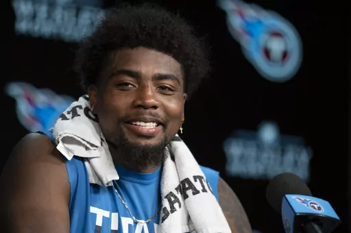 Tennessee Titans wide receiver Treylon Burks responds to questions from reporters at the NFL football team's training facility, Tuesday, May 16, 2023, in Nashville, Tenn. (AP Photo/George Walker IV)