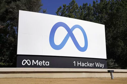 Facebook's Meta logo sign is seen at the company headquarters in Menlo Park, Calif. on Oct. 28, 2021. According to a report released Thursday, June 9, 2022, Facebook and parent company Meta once again failed to detect blatant, violent hate speech in advertisements submitted to the platform by the nonprofit groups Global Witness and Foxglove. (AP Photo/Tony Avelar, File)