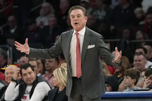 St. John's head coach Rick Pitino stands on the court during the first half of an NCAA college basketball game against New Mexico, Sunday, Nov. 17, 2024, in New York. (AP Photo/Pamela Smith)