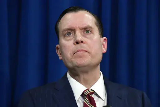 Kentucky Attorney General Russell Coleman speaks in Frankfort, Ky., Tuesday, Jan. 2, 2024. (AP Photo/Timothy D. Easley)