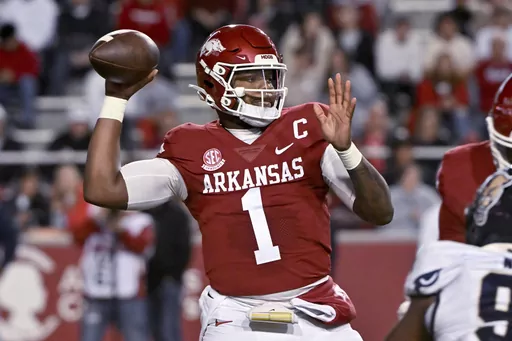 Arkansas quarterback KJ Jefferson (1) drops back to pass against Florida International during the first half of an NCAA college football game Saturday, Nov. 18, 2023, in Fayetteville, Ark. (AP Photo/Michael Woods)