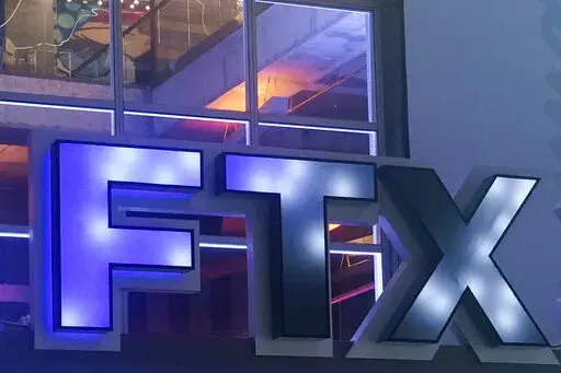The FTX Arena logo is seen where the Miami Heat basketball team plays Nov. 12, 2022, in Miami. The former CEO of the failed cryptocurrency exchange FTX said Wednesday, Nov. 30, that he did not ‘knowingly" misuse customers' funds, and claimed he believes his millions of angry customers will eventually be made whole. (AP Photo/Marta Lavandier, File)