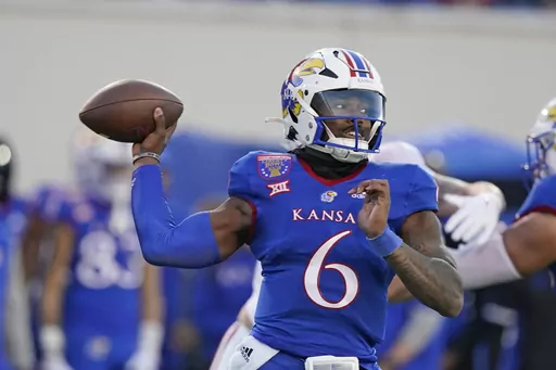 Kansas quarterback Jalon Daniels throws a pass against Arkansas during the first half of the Liberty Bowl NCAA college football game Wednesday, Dec. 28, 2022, in Memphis, Tenn. Kansas opens their season at home against Missouri State on Sept. 1. (AP Photo/Rogelio V. Solis, File)