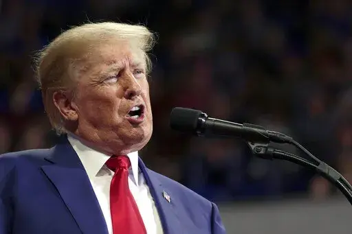 Former President Donald Trump speaks at a rally in Wilkes-Barre, Pa., Saturday, Sept. 3, 2022. The Trump Organization is going on trial accused of helping some top executives avoid income taxes on compensation they got in addition to their salaries, like rent-free apartments and luxury cars. (AP Photo/Mary Altaffer, File)