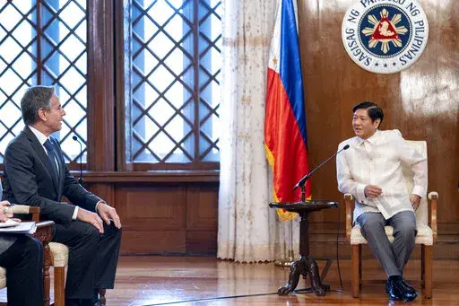 Secretary of State Antony Blinken, left, meets with Philippine President Ferdinand Marcos Jr. at the Malacanang Palace in Manila, Philippians, Saturday, Aug. 6, 2022. Blinken is on a ten day trip to Cambodia, Philippines, South Africa, Congo, and Rwanda. (AP Photo/Andrew Harnik, Pool)
