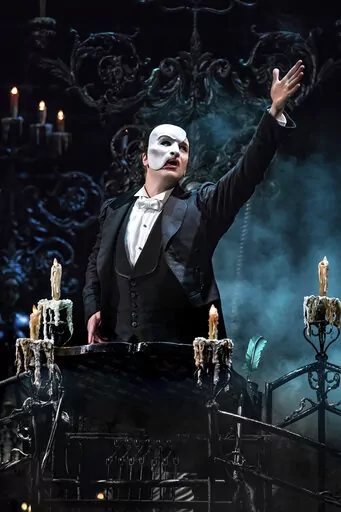 This image released by The Publicity Office shows Ben Crawford during a performance of "The Phantom of the Opera," in New York. (Matthew Murphy/The Publicity Office via AP)