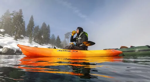 This photo provided by Clean Up The Lake shows Surface Support on the 72 Mile Clean Up during the winter of 2022, in Lake Tahoe, Nev. They found no trace of a mythical sea monster, no sign of mobsters in cement shoes or long-lost treasure chests. But scuba divers who spent the past year cleaning up Lake Tahoe's entire 72-mile (115-kilometer) shoreline have come away with what they hope will prove much more valuable: tons and tons of trash. (Clean Up The Lake via AP)