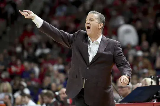 Arkansas coach John Calipari talks to his team from the sideline against Lipscomb during the second half of an NCAA college basketball game Wednesday, Nov. 6, 2024, in Fayetteville, Ark. (AP Photo/Michael Woods)