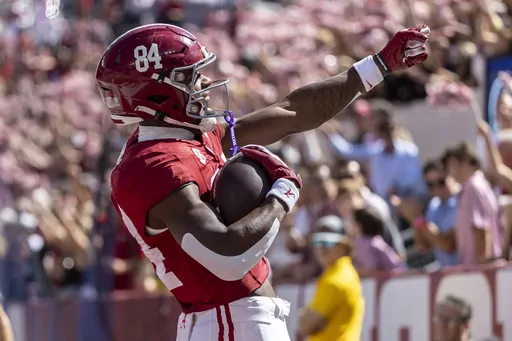 Alabama tight end Amari Niblack (84) celebrates his touchdown reception against Arkansas during the first half of an NCAA college football game, Saturday, Oct. 14, 2023, in Tuscaloosa, Ala. (AP Photo/Vasha Hunt)