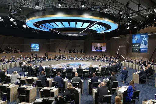 Leaders take their seats for a meeting of the NATO-Ukraine Council during the NATO summit in Washington, July 11, 2024. European allies in NATO are stepping up their military spending, just as Donald Trump wanted. In words, deeds and arms deals, leaders of the United States' partner countries in NATO are making the case for the military alliance in ways likely to appeal to the presumed Republican presidential nominee. (AP Photo/Jacquelyn Martin, File)