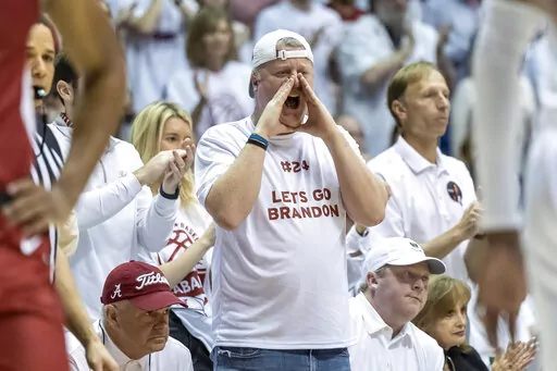 Alabama fans cheer during the first half of an NCAA college basketball game against Arkansas, Saturday, Feb. 25, 2023, in Tuscaloosa, Ala. (AP Photo/Vasha Hunt)