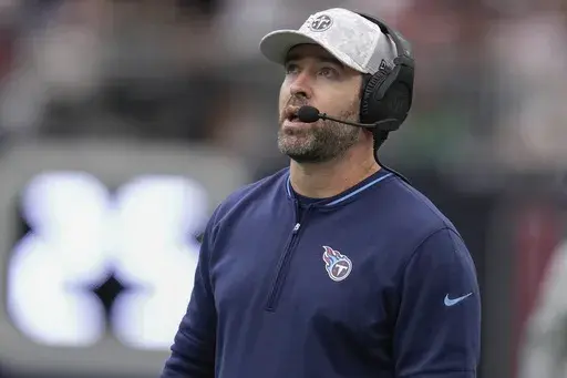 Tennessee Titans head coach Brian Callahan looks onto the field during the first half of an NFL football game against the Houston Texans, Sunday, Nov. 24, 2024, in Houston. (AP Photo/Eric Christian Smith)