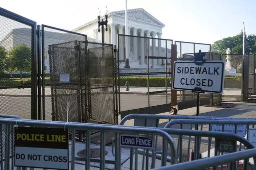 The Supreme Court, Friday, June 24, 2022, in Washington. (AP Photo/Steve Helber)
