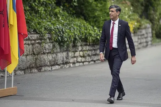 British Prime Minister Rishi Sunak arrives at the Ukraine peace summit in Obbürgen, Switzerland, Saturday, June 15, 2024. Switzerland is hosting scores of world leaders this weekend to try to map out the first steps toward peace in Ukraine. (AP Photo/Laurent Cipriani)