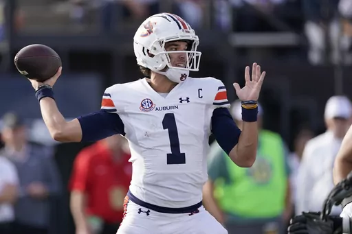 Auburn quarterback Payton Thorne (1) looks to throw a pass against Vanderbilt in the first half of an NCAA college football game Saturday, Nov. 4, 2023, in Nashville, Tenn. (AP Photo/George Walker IV)