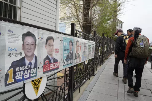 People pass by posters of candidates running for the upcoming parliamentary election in Seoul, South Korea, Wednesday, April 3, 2024. As South Koreans prepare to vote for a new 300-member parliament next week, many are choosing their livelihoods and other domestic topics as their most important election issues. This represents a stark contrast from past elections, which were overshadowed by security and foreign policy issues like North Korean nuclear threats and the U.S. security commitment.(AP 