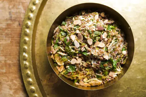 This image released by Milk Street shows a recipe for Fennel and Brussels Sprouts Salad. (Milk Street via AP)