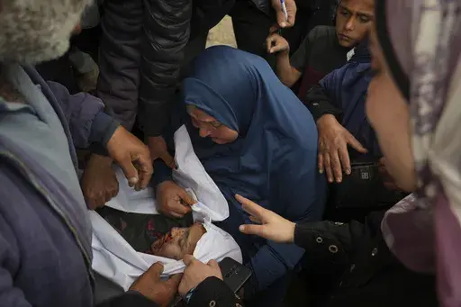 Awatif Sabbah mourns her daughter, Jana,10, killed by an Israeli airstrike, at the hospital in Deir al-Balah, Gaza Strip, on Tuesday, April 8, 2025. (AP Photo/Abdel Kareem Hana)