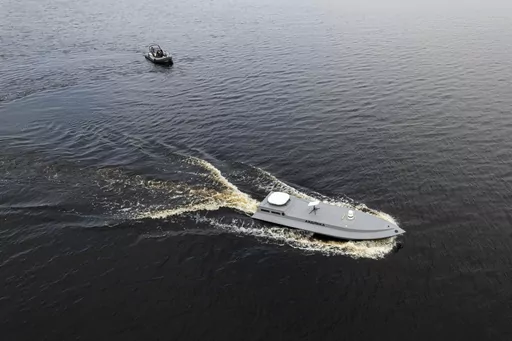 A sea drone cruises on the water during a presentation by Ukraine's Security Service in Kyiv region, Ukraine, on Tuesday, March 5, 2024. (AP Photo/Evgeniy Maloletka, File)