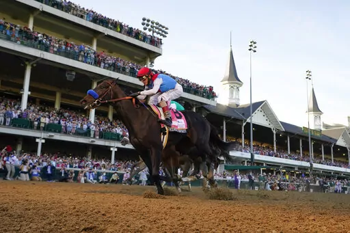 John Velazquez rides Medina Spirit across the finish line to win the 147th running of the Kentucky Derby at Churchill Downs in Louisville, Ky., May 1, 2021. The Kentucky Derby television broadcast will be produced by a woman for the first time in the 148-year-old history of the race. Lindsay Schanzer on Thursday, April 21, 2022, will be named senior producer of NBC Sports’ Derby coverage and oversee the network’s horse racing production. It’s her 10th Derby but her first running the show a