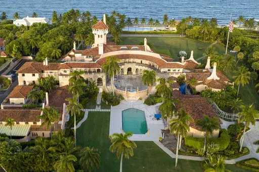 This is an aerial view of President Donald Trump's Mar-a-Lago estate, Aug. 10, 2022, in Palm Beach, Fla. The Justice Department on Friday, Aug. 26, released a partially blacked-out document explaining the justification for an FBI search of former President Donald Trump’s Florida estate earlier this month, when agents removed top secret government records and other classified documents. (AP Photo/Steve Helber, File)