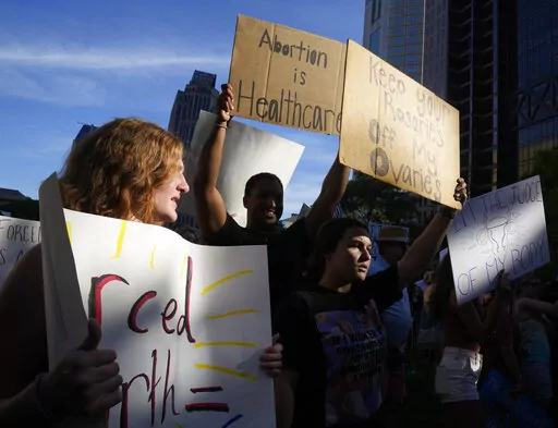 Protesters rally at the Ohio Statehouse in support of abortion rights after the Supreme Court overturned Roe vs. Wade on, June 24, 2022 in Columbus, Ohio. The story about an alleged rape of a 10-year-old Ohio girl who had to travel to Indiana for an abortion touched on a white-hot issue due to the U.S. Supreme Court's ruling on abortion. (Barbara J. Perenic/The Columbus Dispatch via AP, File)