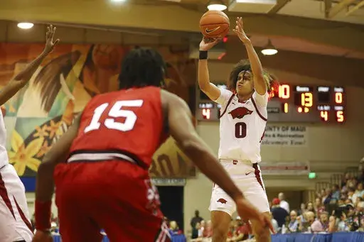 Arkansas guard Anthony Black (0) makes a shot over Louisville during the first half of an NCAA college basketball game, Monday, Nov. 21, 2022, in Lahaina, Hawaii. (AP Photo/Marco Garcia)