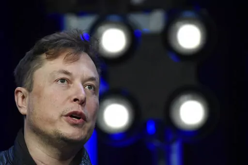 Elon Musk speaks at the SATELLITE Conference and Exhibition March 9, 2020, in Washington. Elon Musk is threatening to end his $44 billion agreement to buy Twitter, accusing the company of refusing to give him information about its spam bot accounts. Lawyers for the Tesla and SpaceX CEO made the threat in a letter to Twitter dated Monday, June 6, 2022 that the social platform included in a filing with the Securities and Exchange Commission. (AP Photo/Susan Walsh, File)