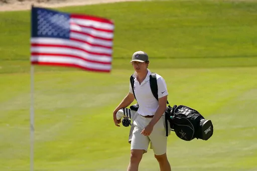 Vanderbilt golfer Gordon Sargent walks to the seventh green during the final round of the NCAA college men's stroke play golf championship, Monday, May 30, 2022, in Scottsdale, Ariz. (AP Photo/Matt York)