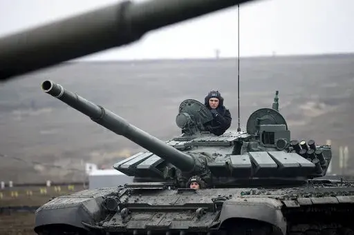 Russian troops take part in drills at the Kadamovskiy firing range in the Rostov region in southern Russia, Dec. 14, 2021. With the fate of Ukraine and potentially broader post-Cold War European stability at stake, the United States and Russia are holding critical strategic talks that could shape the future of not only their bilateral ties but the relationship between the U.S. and its NATO allies. Prospects are bleak. (AP Photo, file)