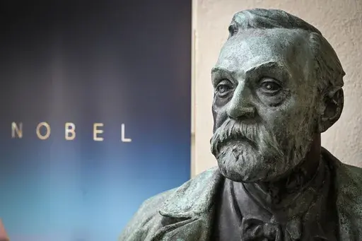 A bust of Alfred Nobel on display following a press conference to announce the Nobel Committee for Physiology or Medicine, at the Karolinska Institute in Stockholm, Sweden, on Monday, Oct. 3, 2022. The first Nobel Prizes were presented in 1901, five years after Nobel's death. (Henrik Montgomery/TT News Agency via AP, File)