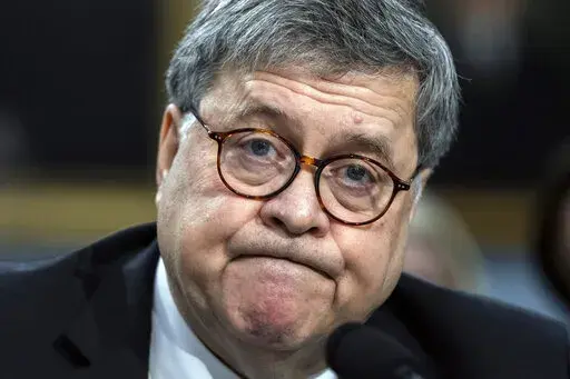 Attorney General William Barr appears before a House Appropriations subcommittee on Capitol Hill in Washington, April 9, 2019. The Justice Department under Attorney General William Barr improperly withheld portions of an internal memorandum Barr cited in publicly announcing that then-President Donald Trump had not committed obstruction of justice in the Russia investigation. That's the ruling by a federal appeals court Friday. (AP Photo/J. Scott Applewhite, File)