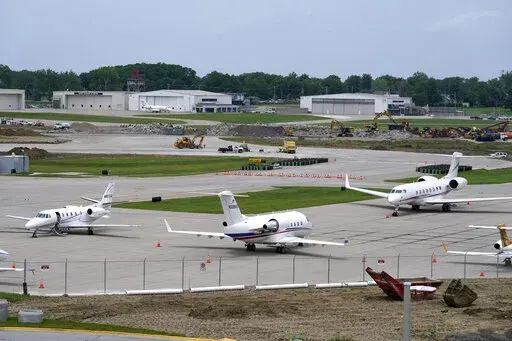 Planes sit on the tarmac at the Des Moines International Airport, Monday, June 13, 2022, in Des Moines, Iowa. With an eye on the upcoming July Fourth weekend, airlines are stepping up their criticism of federal officials over recent widespread flight delays and cancellations. The industry trade group Airlines for America said Friday, June 24, 2022, that understaffing at the Federal Aviation Administration is crippling traffic along the East Coast. (AP Photo/Charlie Neibergall, File)