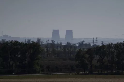 Zaporizhzhia nuclear power plant is seen from around twenty kilometers away in an area in the Dnipropetrovsk region, Ukraine, Monday, Oct. 17, 2022. A statement released Friday, May 26, 2023, by the intelligence directorate of Ukraine's Defense Ministry claimed that Russian forces would strike the Zaporizhzhia nuclear power plant, the biggest in Europe, and then report a radioactive leak in order to trigger an international probe that would pause the hostilities and give the Russian forces the r