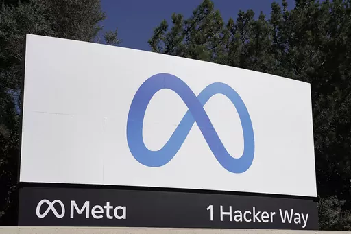 Facebook's Meta logo sign is seen at the company headquarters in Menlo Park, Calif., Oct. 28, 2021. European Union hits Facebook parent Meta with record $1.3 billion fine over transfers of user data to US. (AP Photo/Tony Avelar, File)