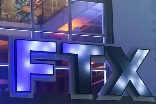 The FTX Arena name is still visible where the Miami Heat basketball team plays Saturday, Nov. 12, 2022, in Miami.  Lawyers for FTX disclosed Tuesday that a “substantial amount" of assets have been stolen from the accounts of the collapsed cryptocurrency exchange, diminishing the odds that its millions of investors will get their money back. (AP Photo/Marta Lavandier, File)