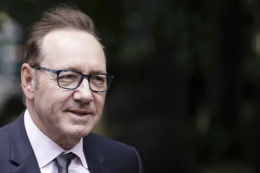 Actor Kevin Spacey arrives at Southwark Crown Court where he is accused of sexual offenses against four men in Britain, in London, Wednesday, July 5, 2023. The actor, charged under his full name of Kevin Spacey Fowler, has pleaded not guilty to all 12 counts, which relate to alleged incidents between 2001 and 2013. (Jordan Pettitt/PA via AP)
