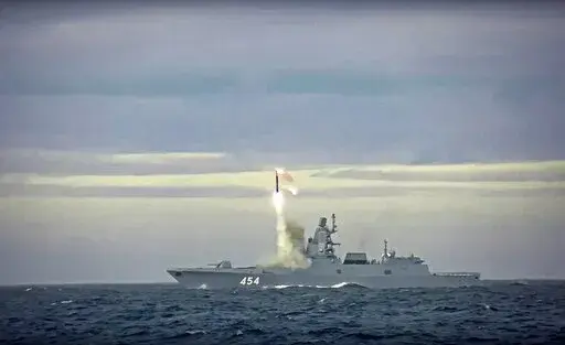 In this image taken from video released by Russian Defense Ministry Press Service on Saturday, May 28, 2022, a new Zircon hypersonic cruise missile is launched by the frigate Admiral Gorshkov of the Russian navy from the Barents Sea. Russia's Defense Ministry said the Russian navy successfully launched a new hypersonic missile from the Barents Sea. The ministry said the recently developed Zircon hypersonic cruise missile had struck its target about 1,000 kilometers away. (Russian Defense Ministr