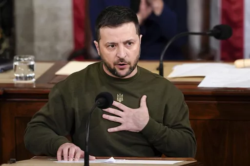 Ukrainian President Volodymyr Zelenskyy addresses a joint meeting of Congress on Capitol Hill in Washington, Dec. 21, 2022. Zelenskyy's visit to Washington this week comes at a critical time as Republican leadership in the House and Senate diverge on the best way to get more military and humanitarian aid over the finish line. (AP Photo/Carolyn Kaster, File)
